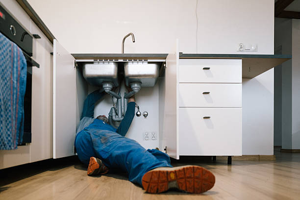 Professional Plumbing technician working in Mc Neil, TX